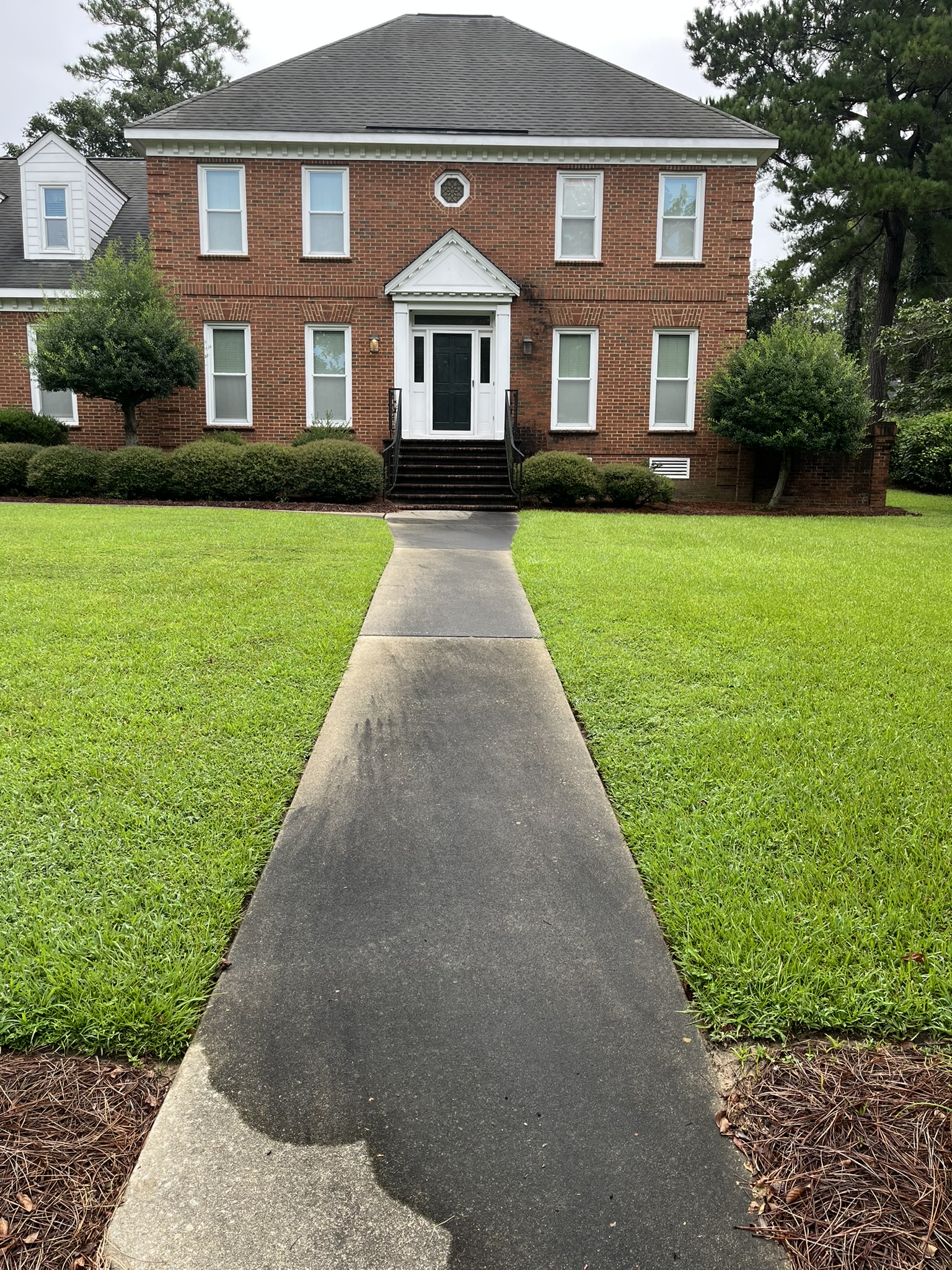 Dirty sidewalk before cleaning
